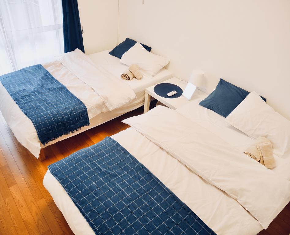 Izumi Apartment Osaka Buitenkant foto